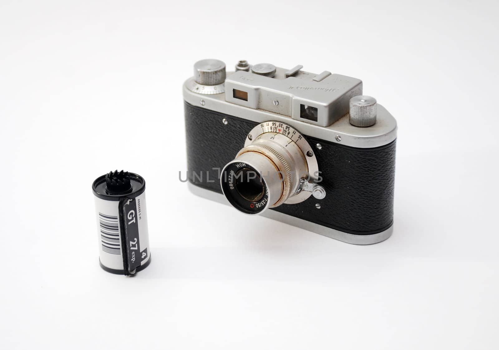 retro old vintage analog photo camera and film by nehru