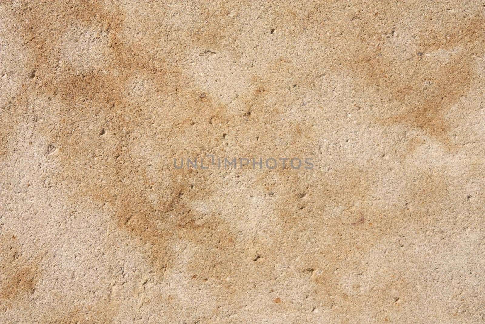 Grunge sandstone background texture. Old stained wall.