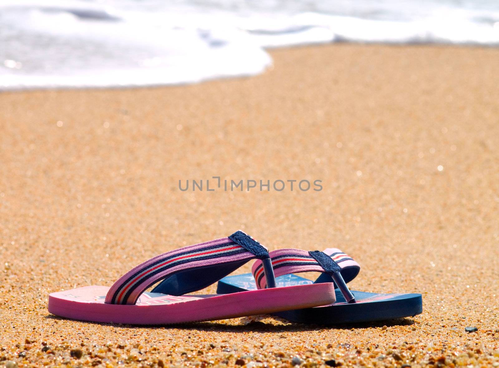 Slippers on the beach 