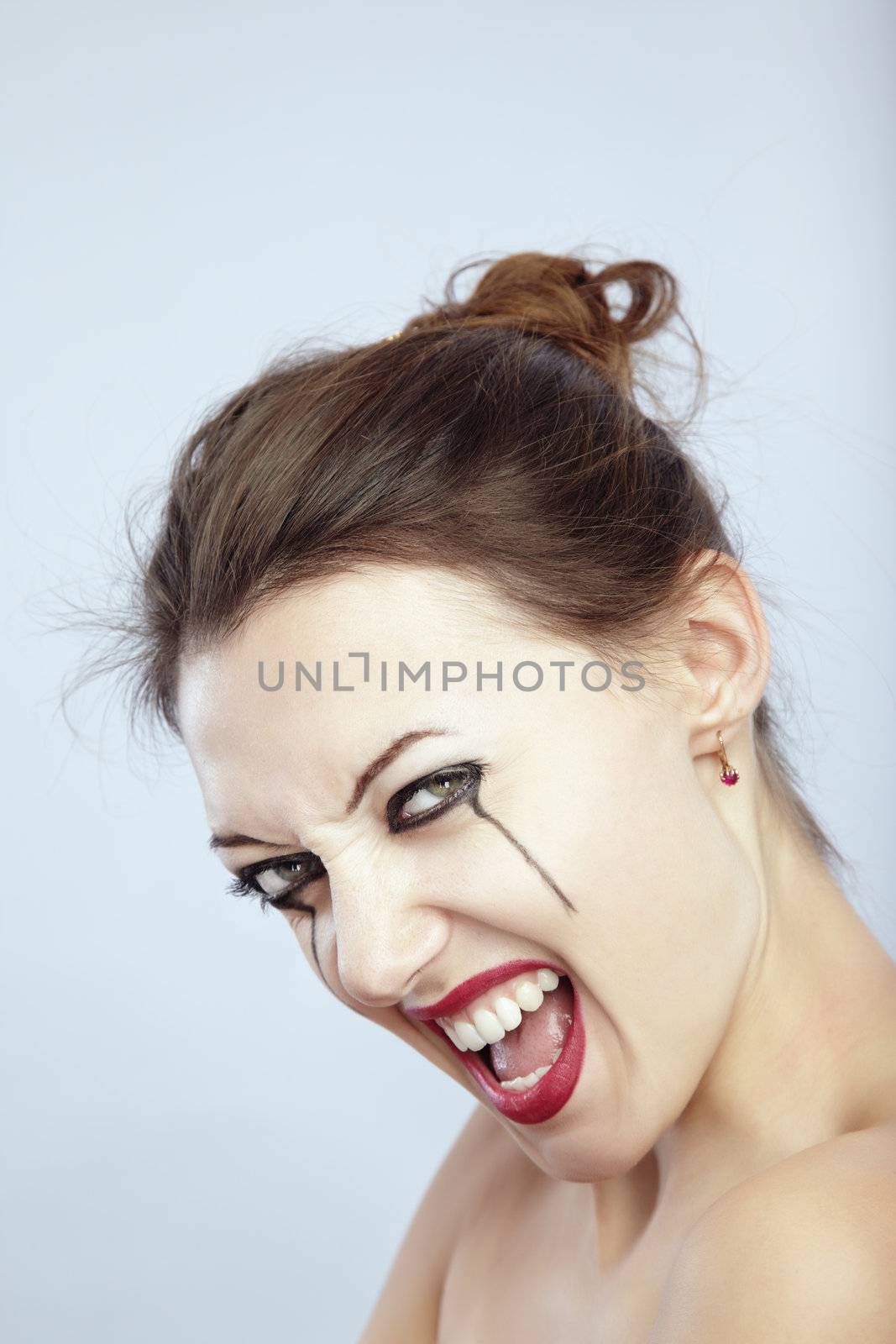Crying woman with flowing make-up
