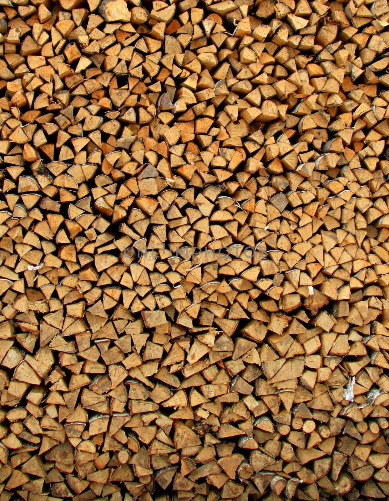 Wooden logs stacked in series