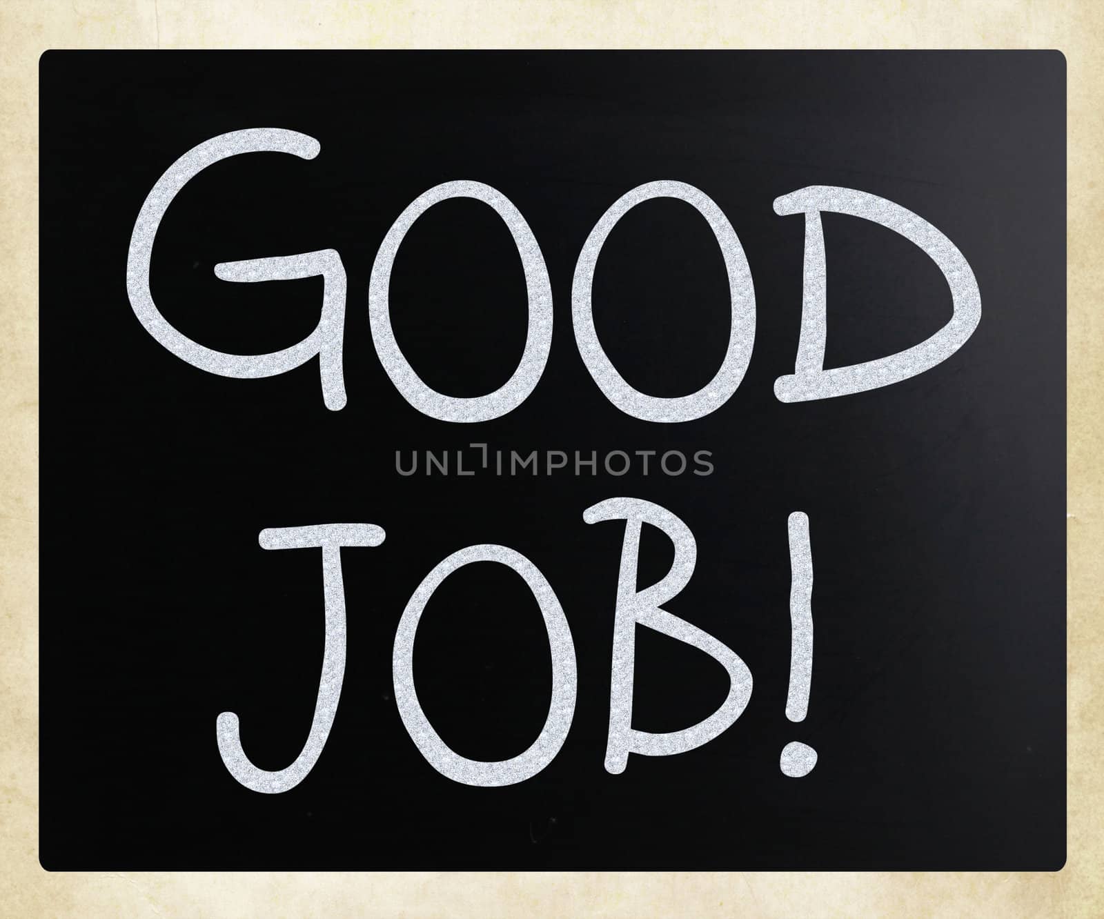 "Good job!" handwritten with white chalk on a blackboard