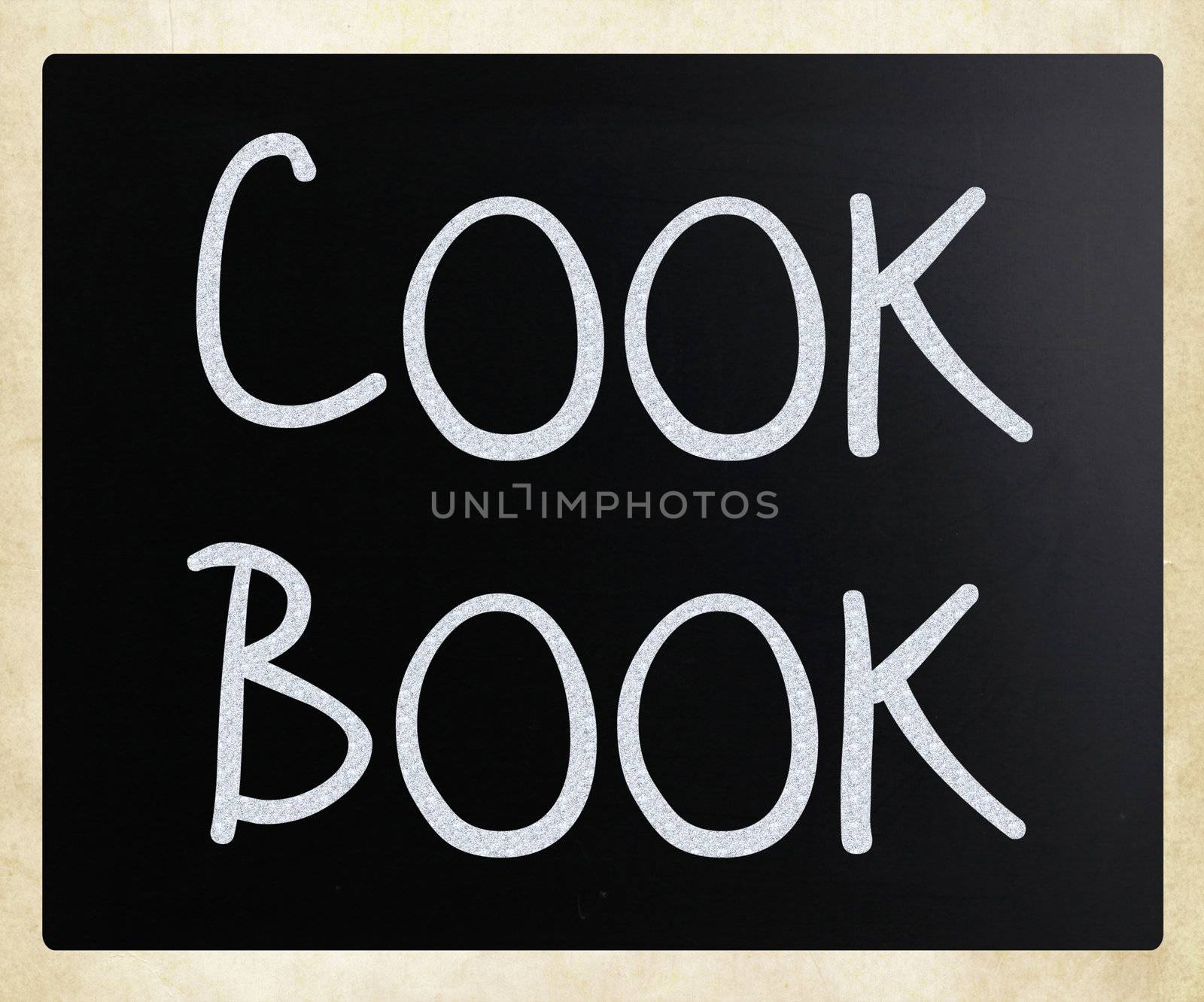 "Cook book" handwritten with white chalk on a blackboard