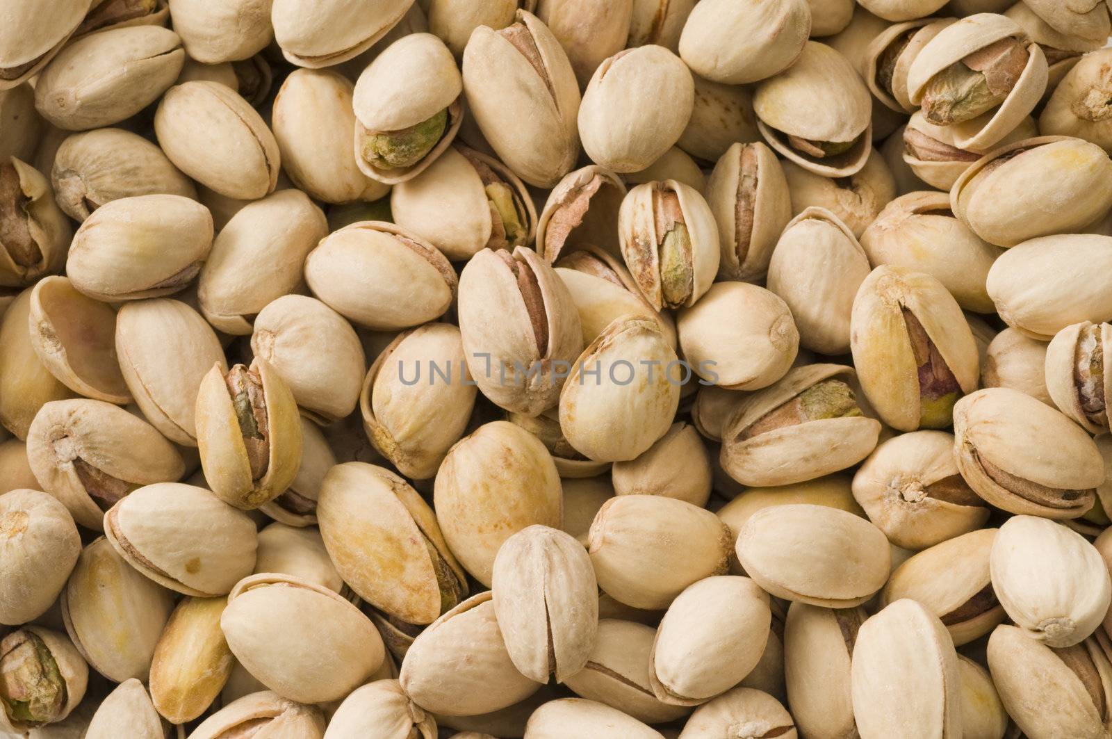 Macro image of multiple pistachios good for a background