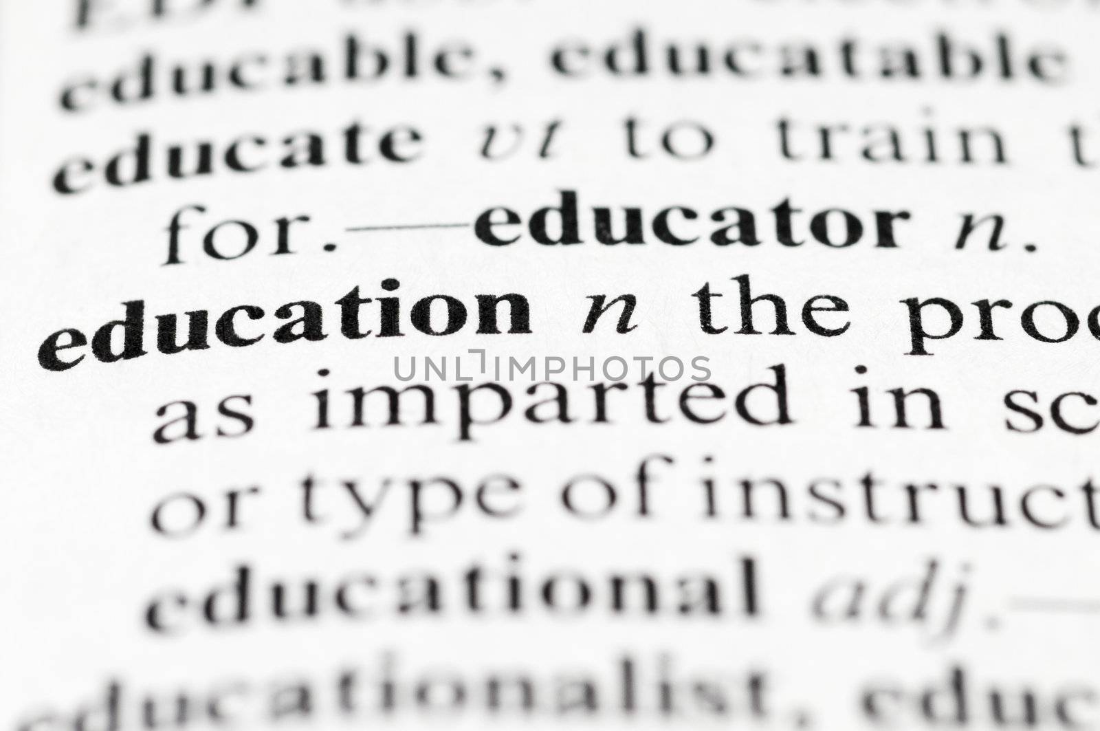 Dictionary macro photo with selective focuse on the word Education