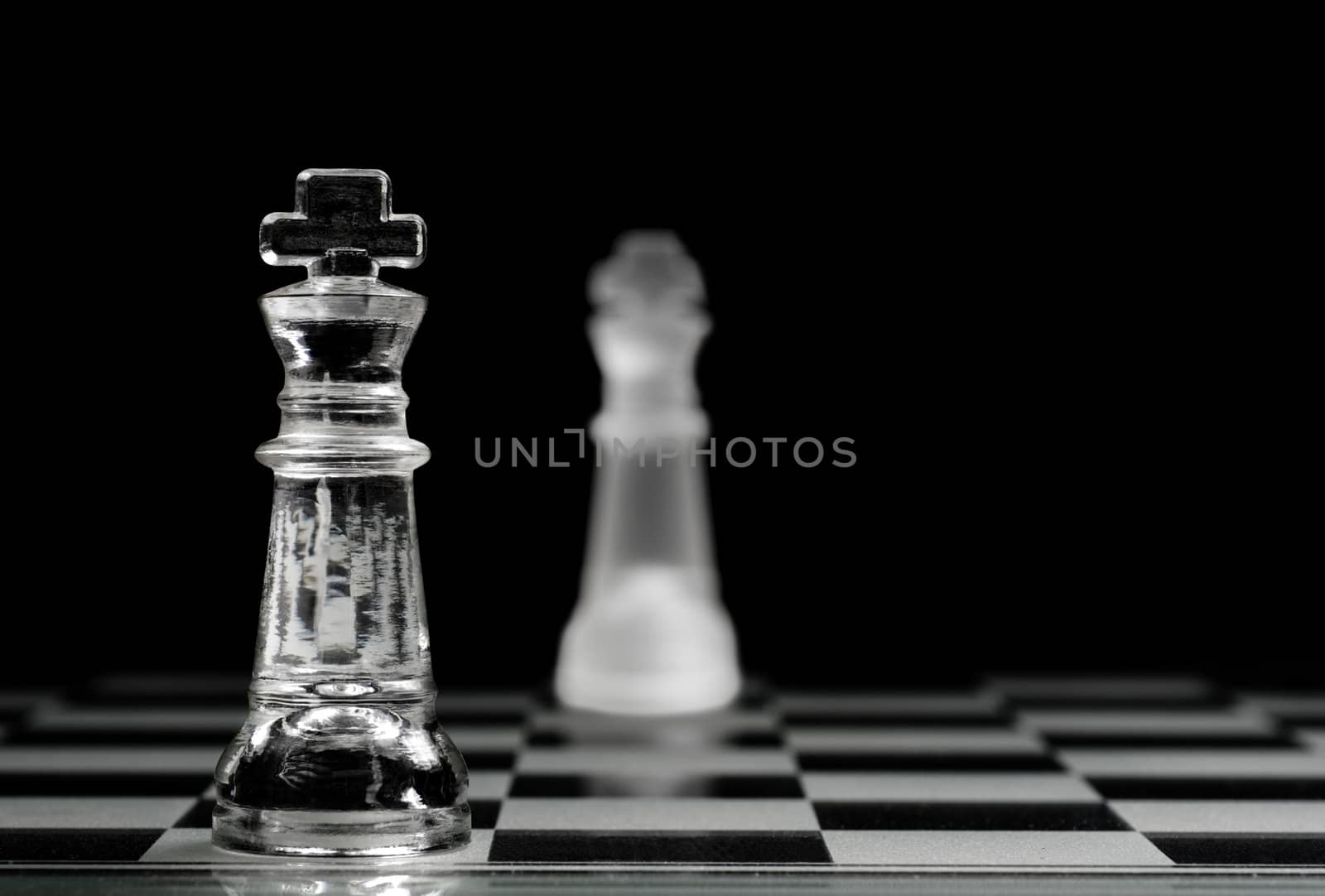 Kings facing each other, foreground king with selective focus