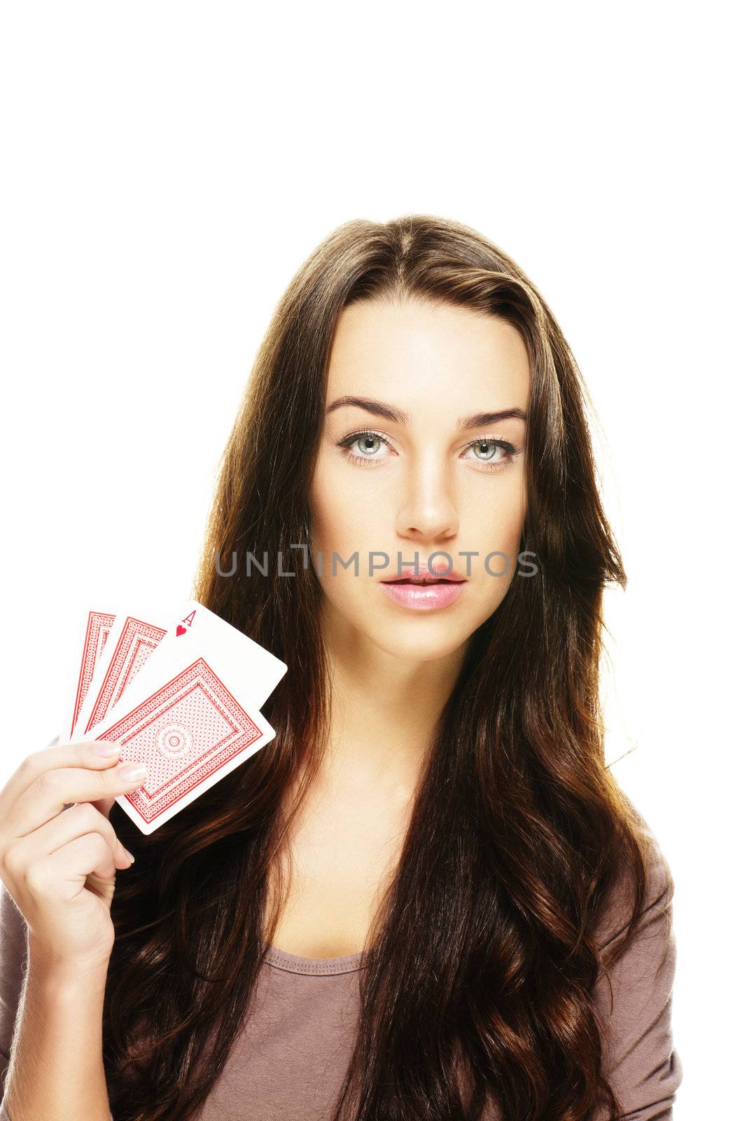 beautiful woman holding poker cards on white background