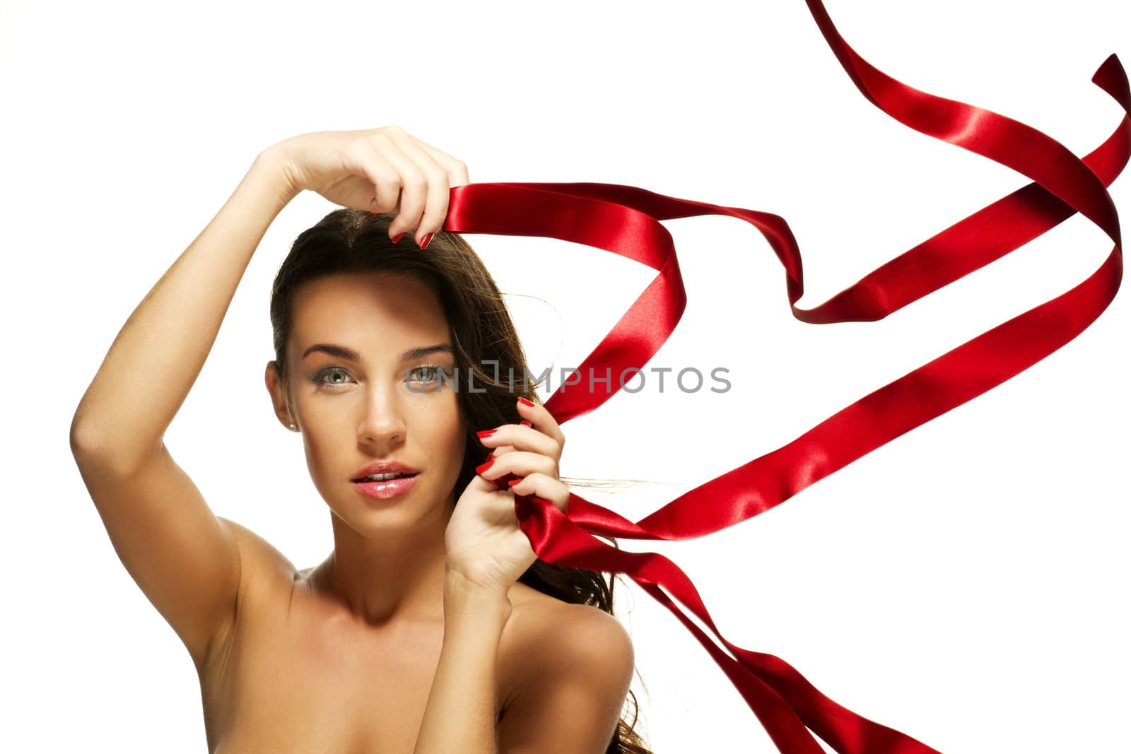 beautiful woman with a red ribbon on white background