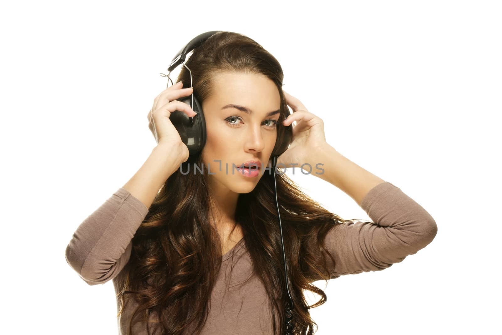 beautiful woman listening to music on white background