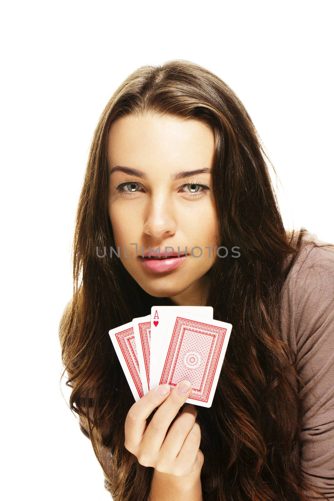 tense looking woman playing poker on white background
