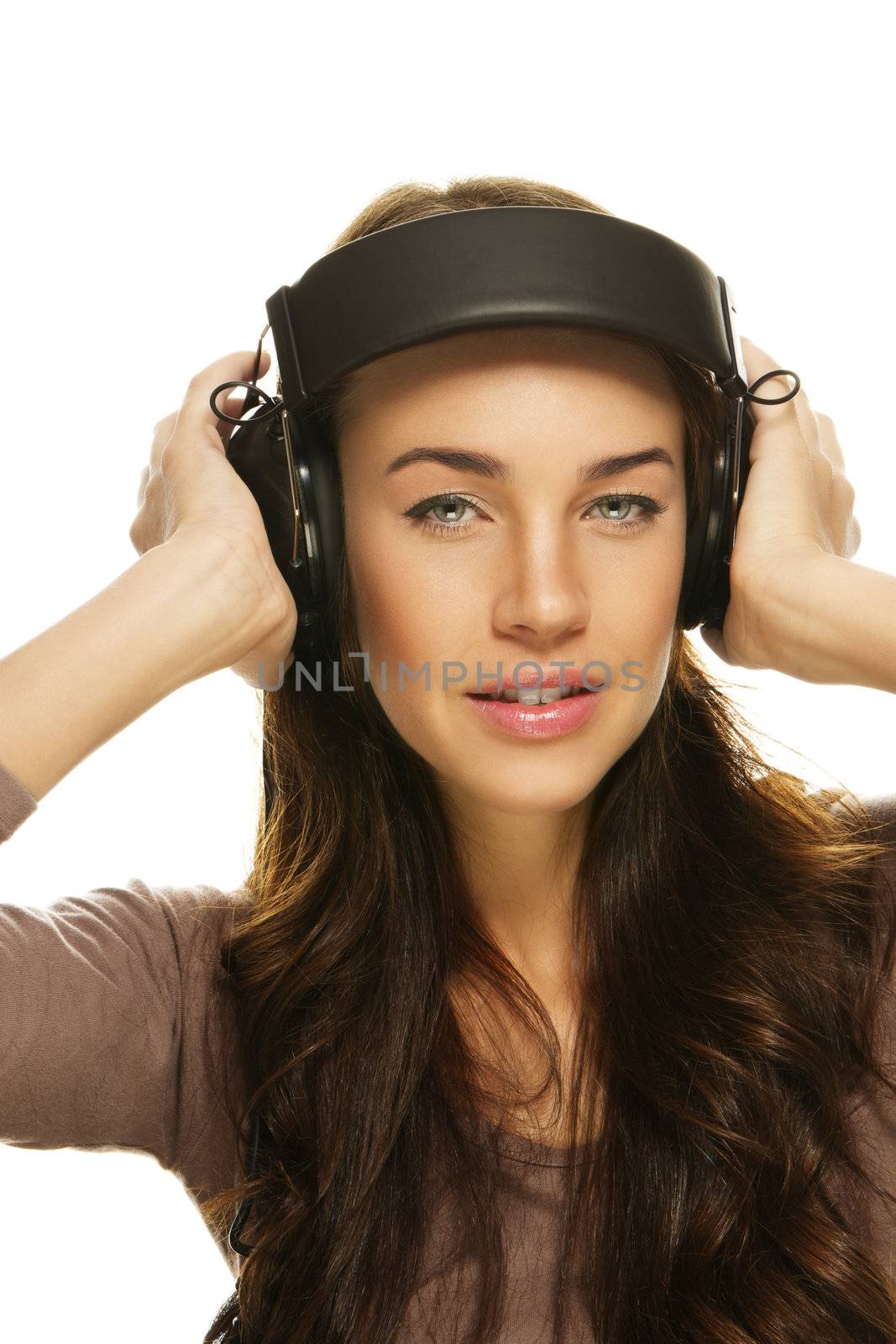 young woman with headphones on white background