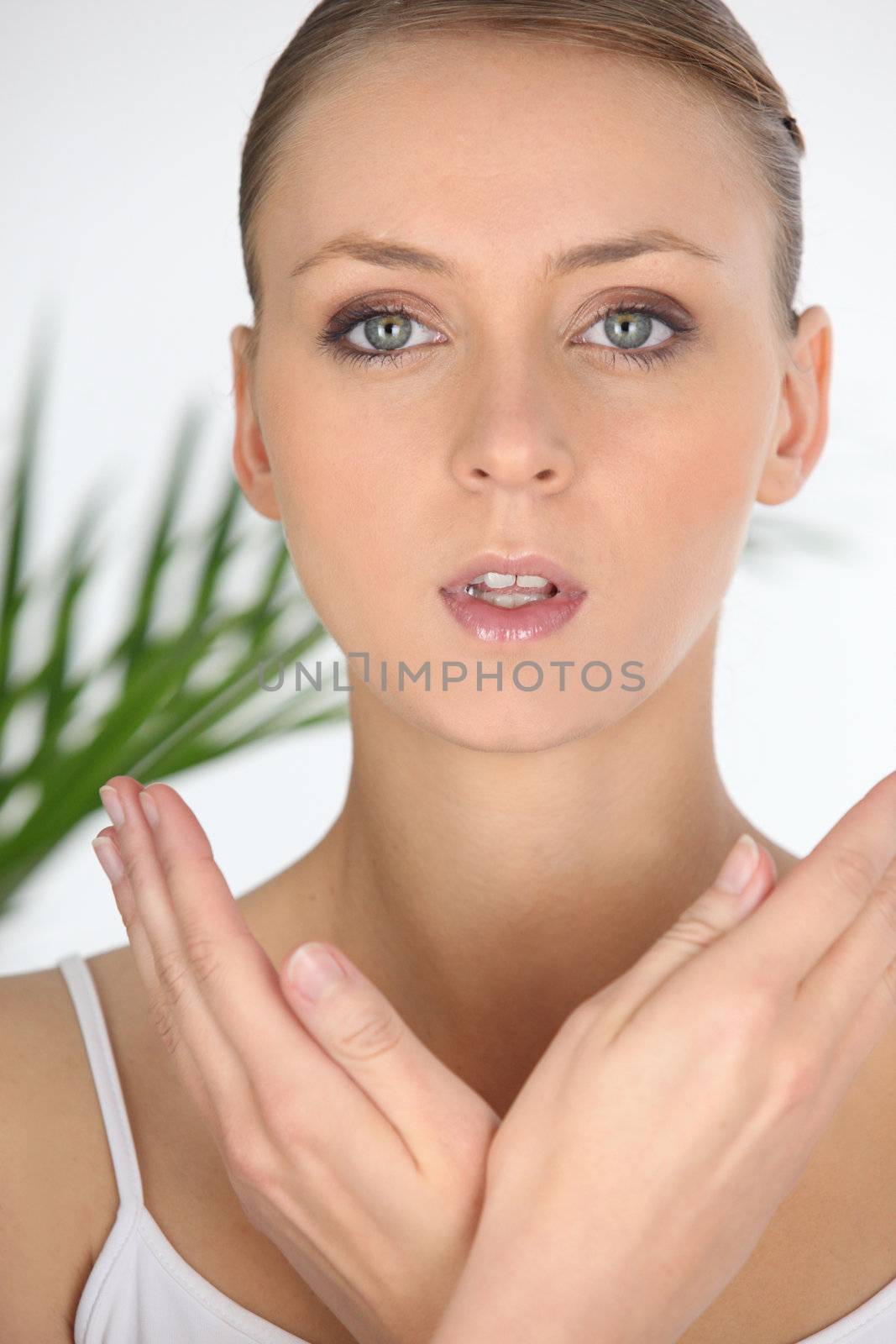 Closeup portrait of a woman in a beauty spa by phovoir
