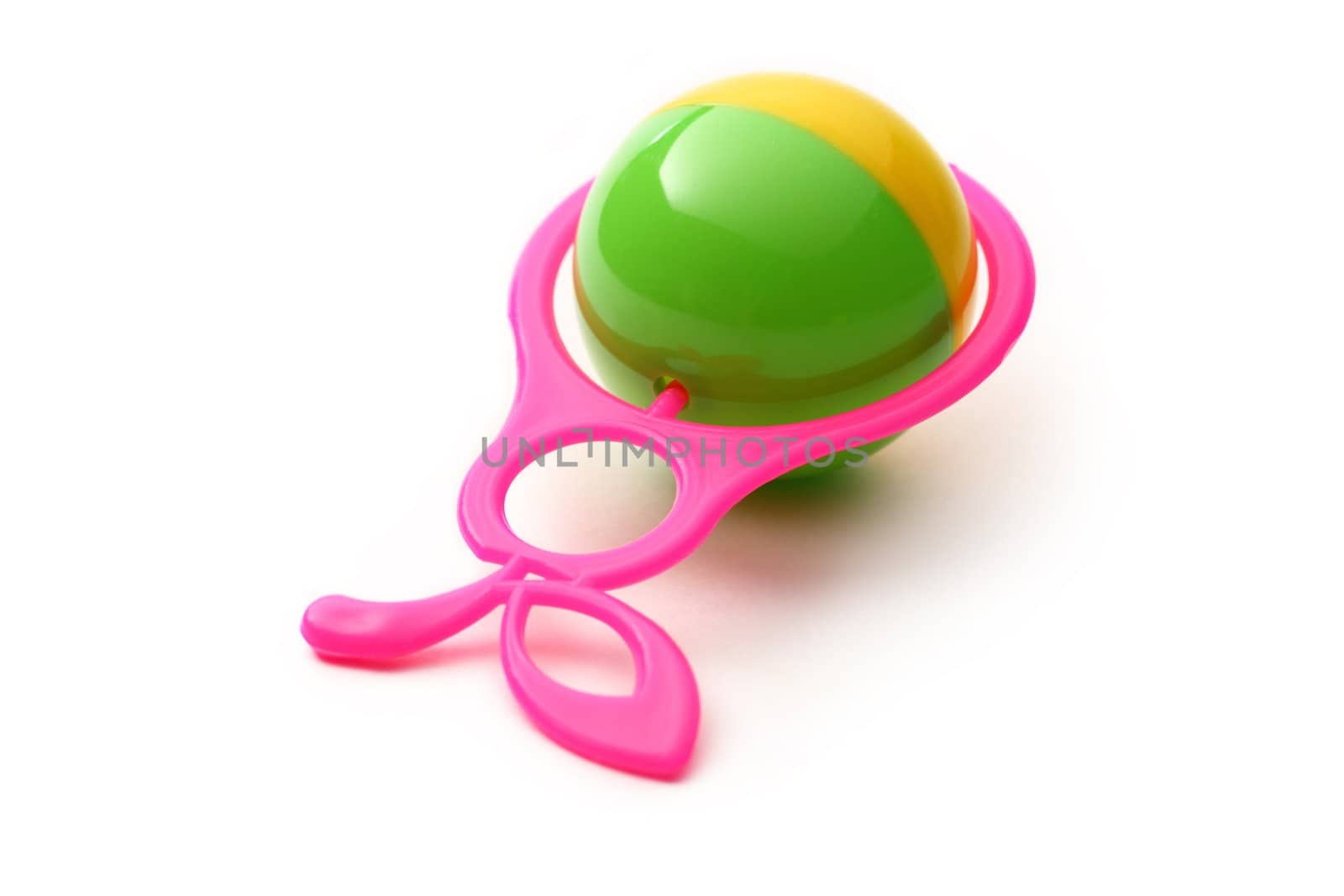 Colourful rattle on white background