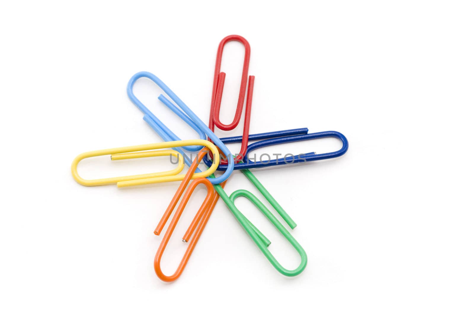 Paper clip teamwork isolation on a white background