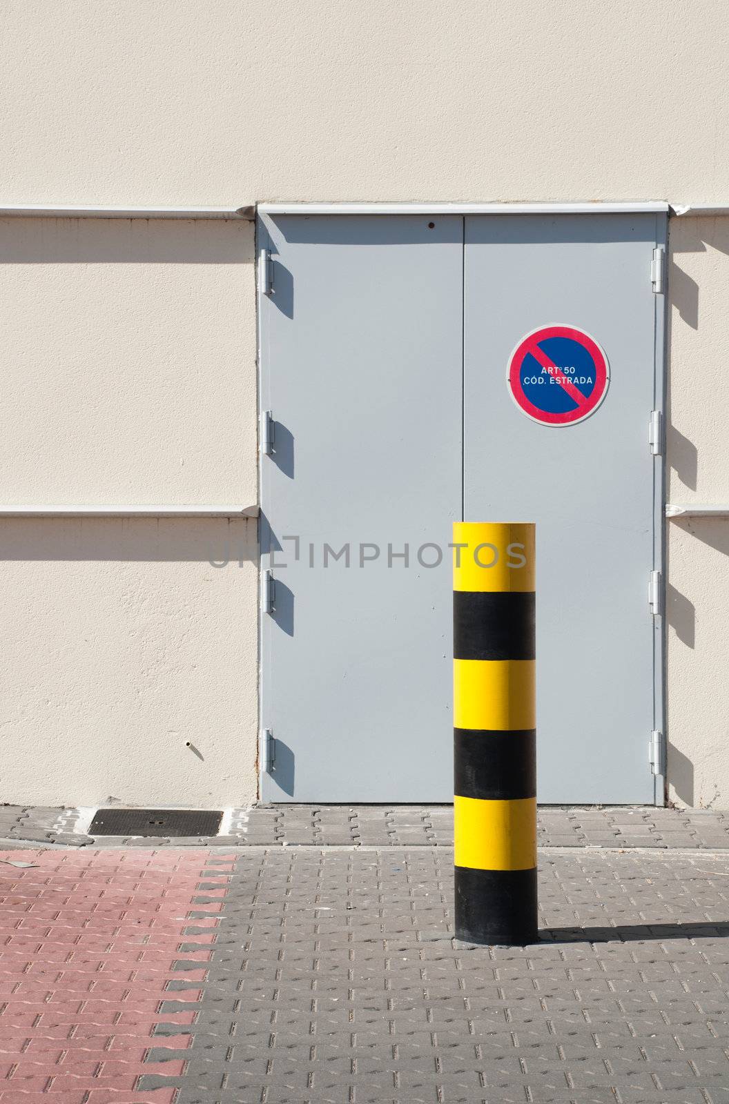 industrial warehouse with emergency exit door (parking vehicles is strictly forbidden)