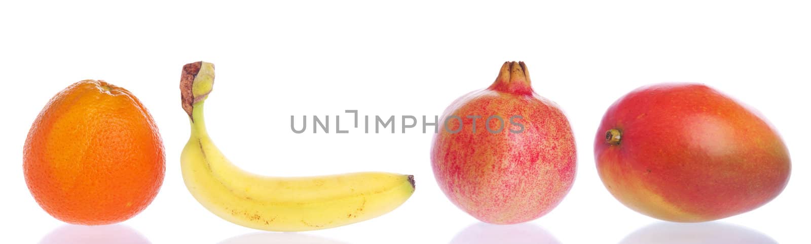 gorgeous fruits collection (orange, banana, pomegranate, mango) isolated on white background