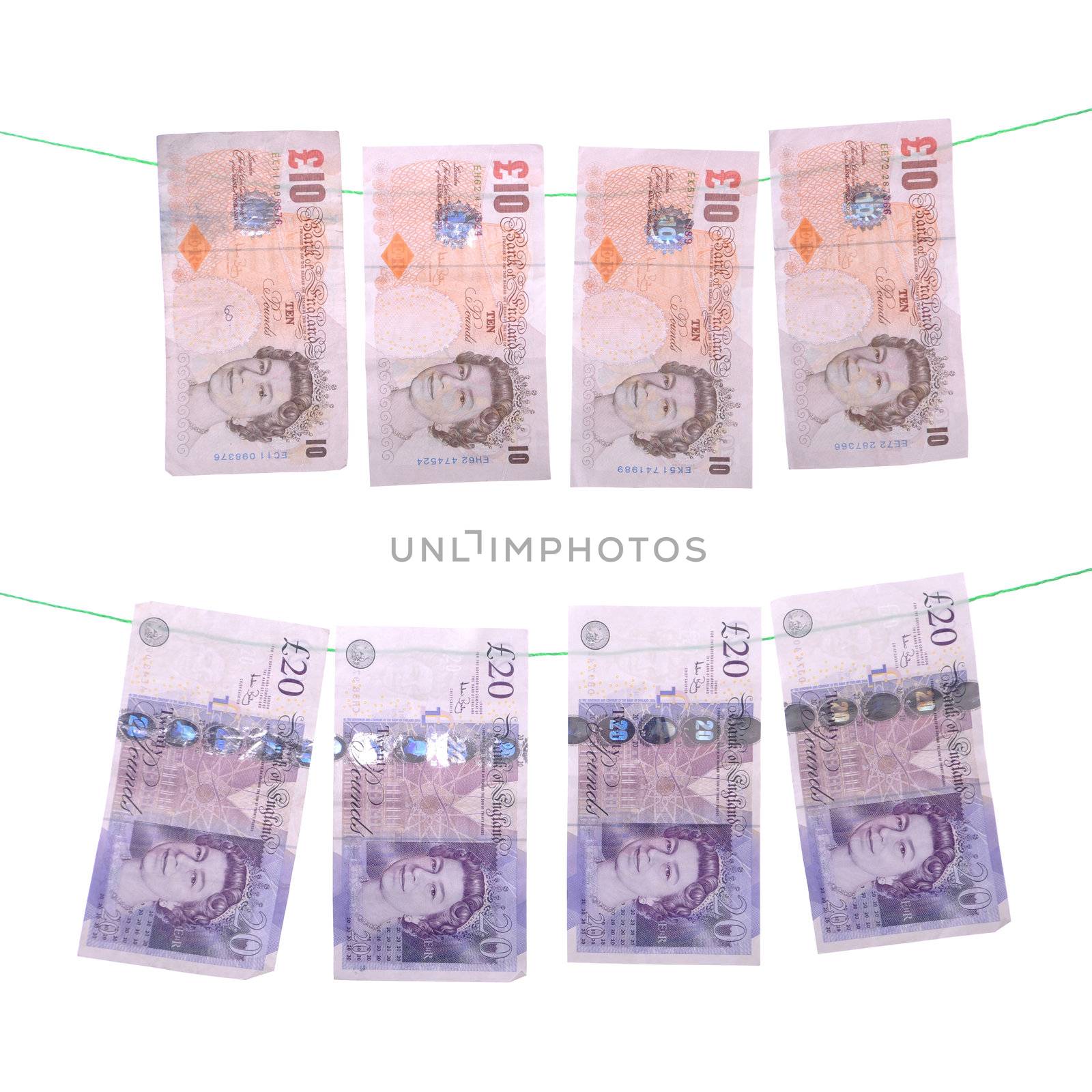 money laundering concept with pound notes (isolated on white background)