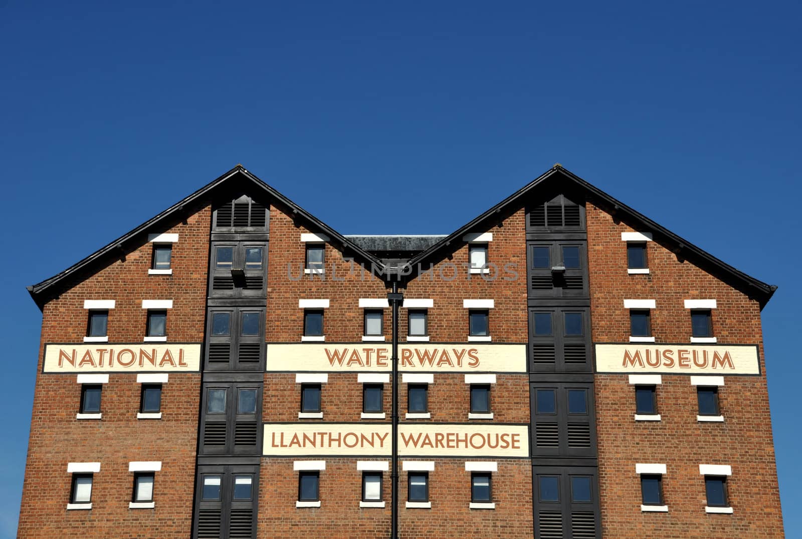 GLOUCESTER - AUGUST 30: 2010 National waterways museum on a warehouse building on August 30, 2010 in Gloucester docks, UK