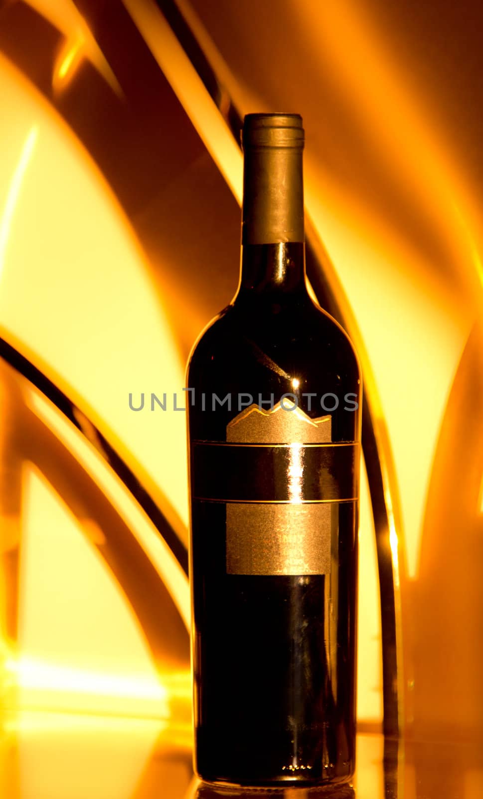 A wine bottle with a dreamy golden background lit by the rising morning sun