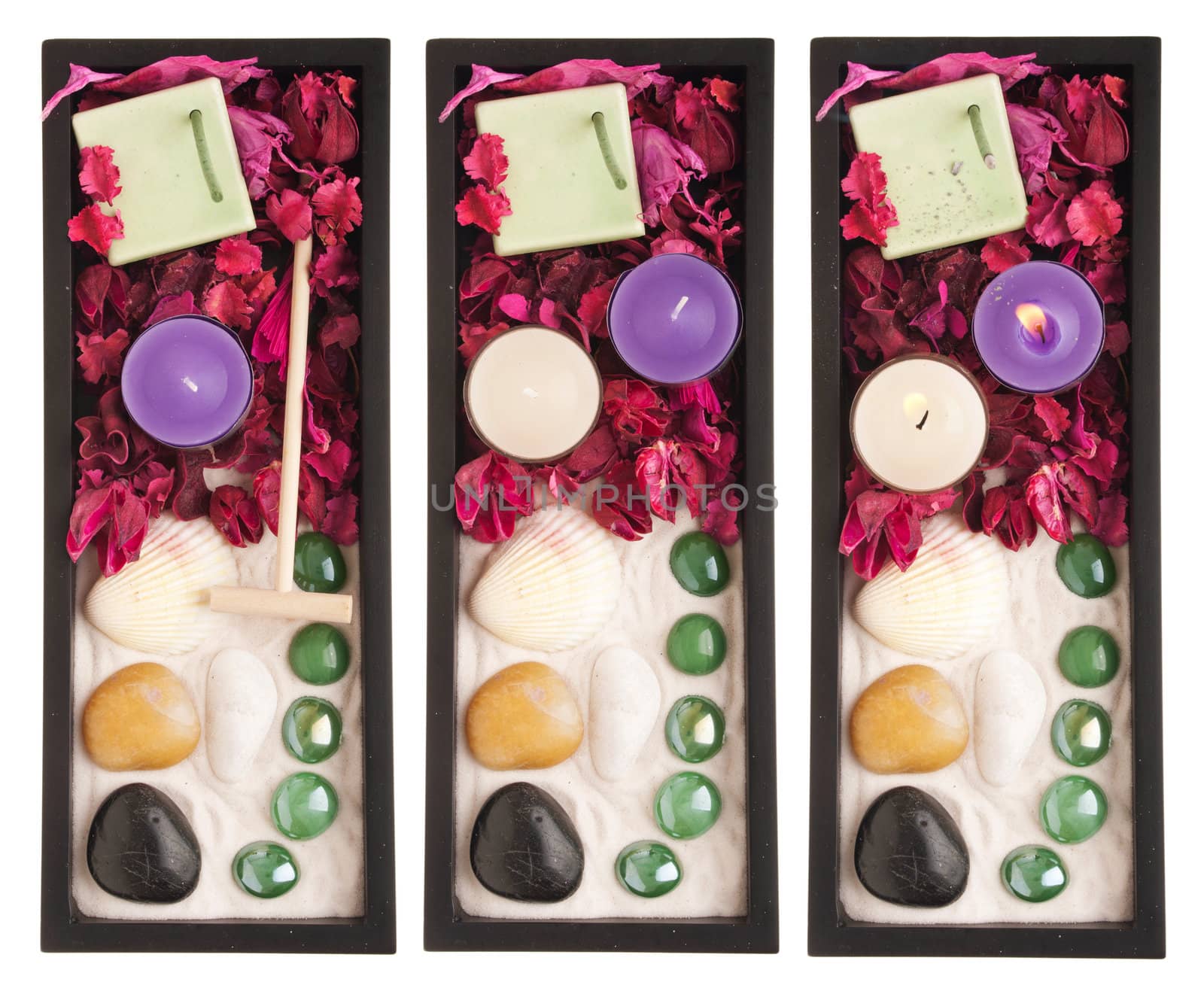 gorgeous spa setting collection with candles, stones, sand, rake, incense and dry petal roses and other flowers on a black tray (isolated on white background)