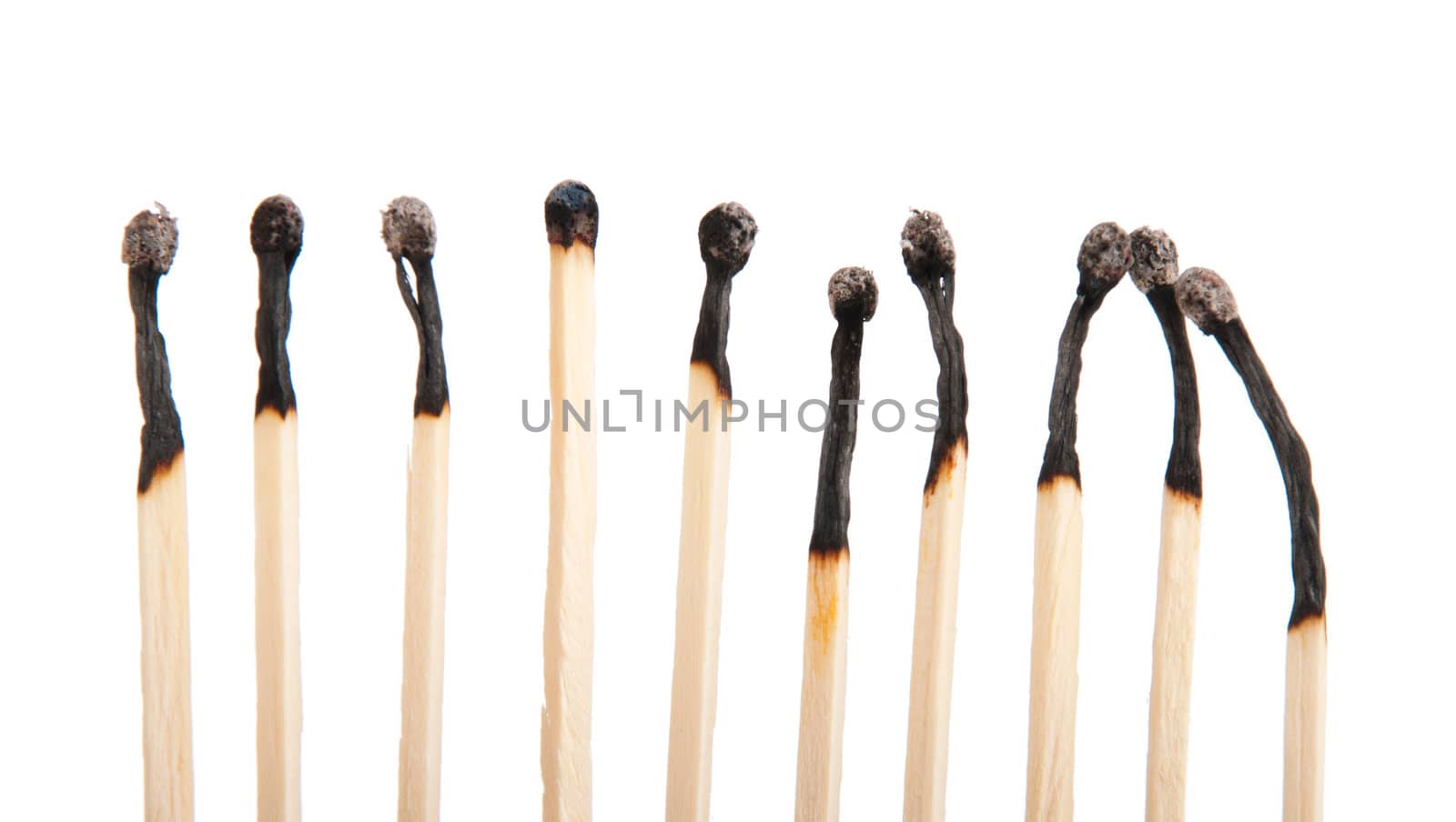 group of burnt matches (isolated on a white background)