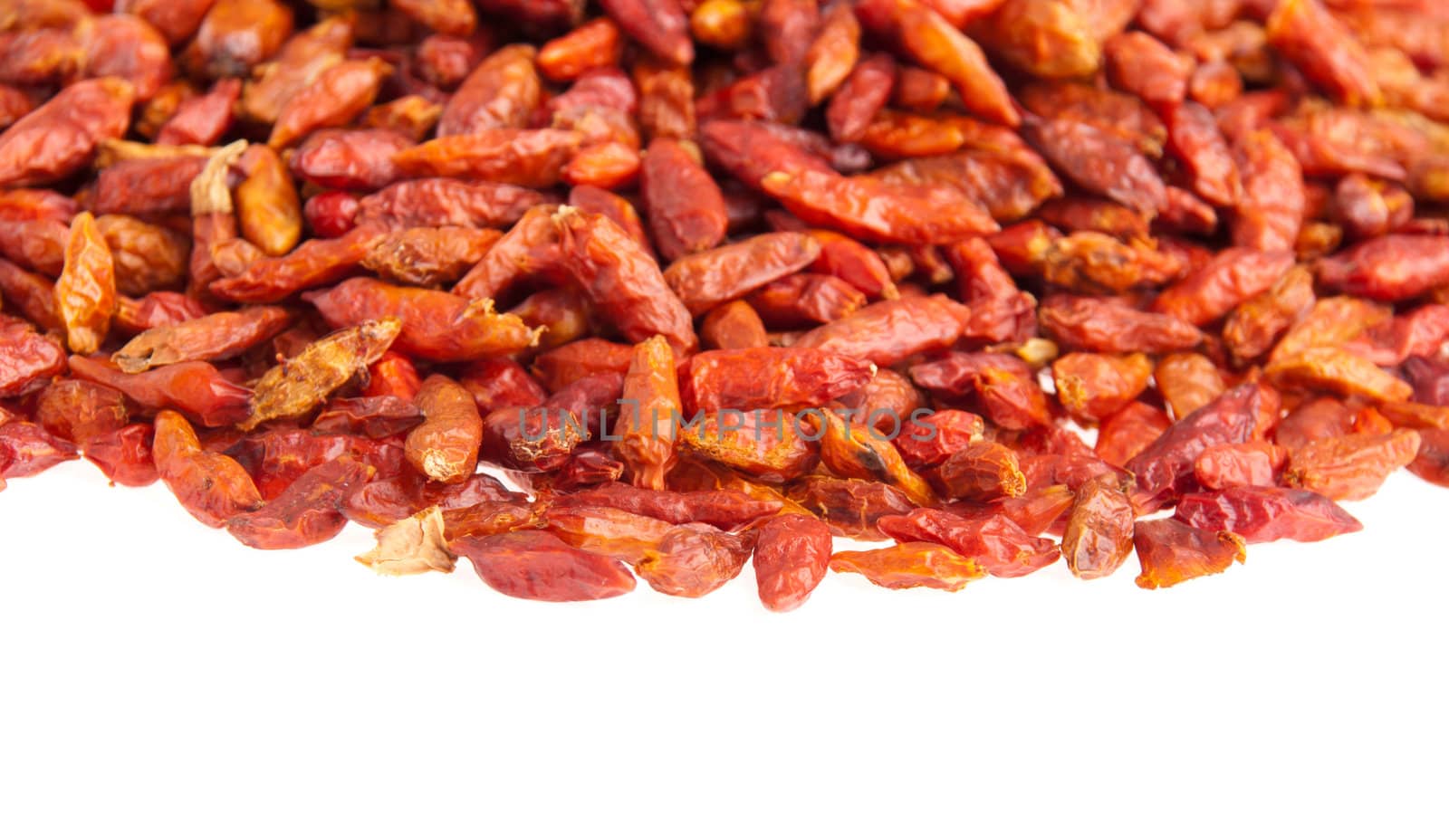 pile of Piri Piri peppers isolated on white background (close-up picture, shallow depth of field)