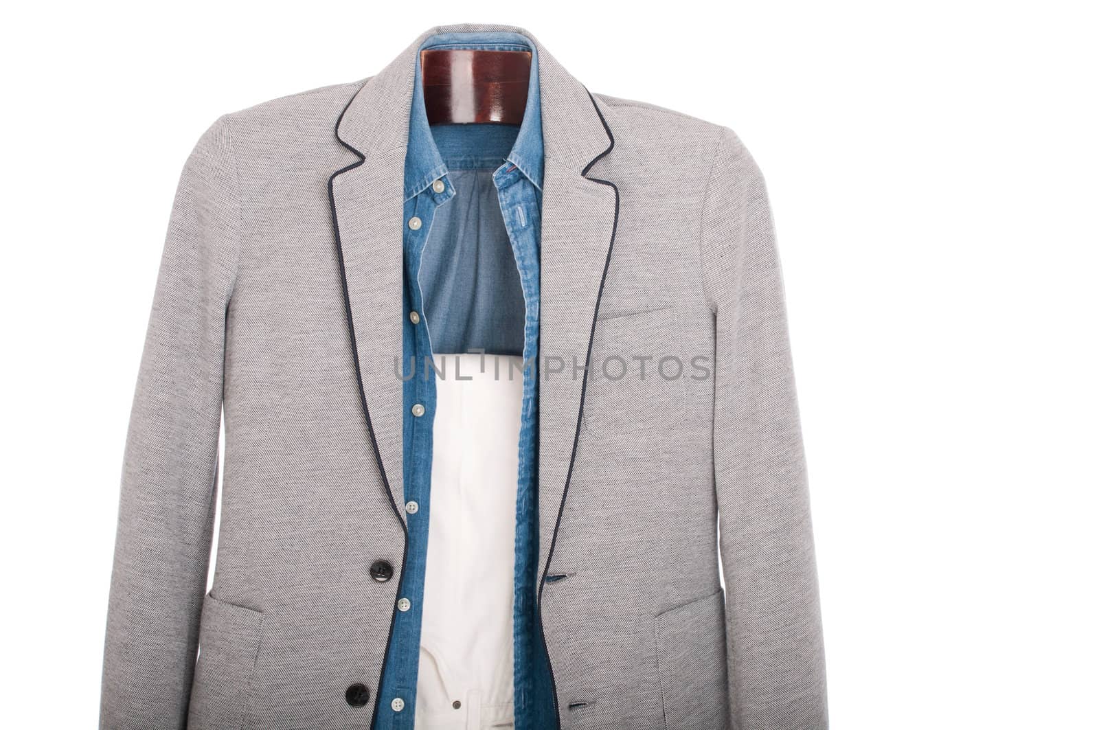 smart casual man dressing for a celebration, event, wedding or night-out on a wooden hanger (shirt, jacket and trousers) isolated on white background