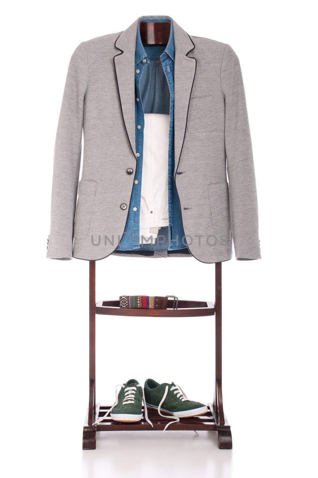 smart casual man dressing for a celebration, event, wedding or night-out on a wooden hanger (shirt, jacket, trousers, belt and stylish sport shoes) isolated on white background