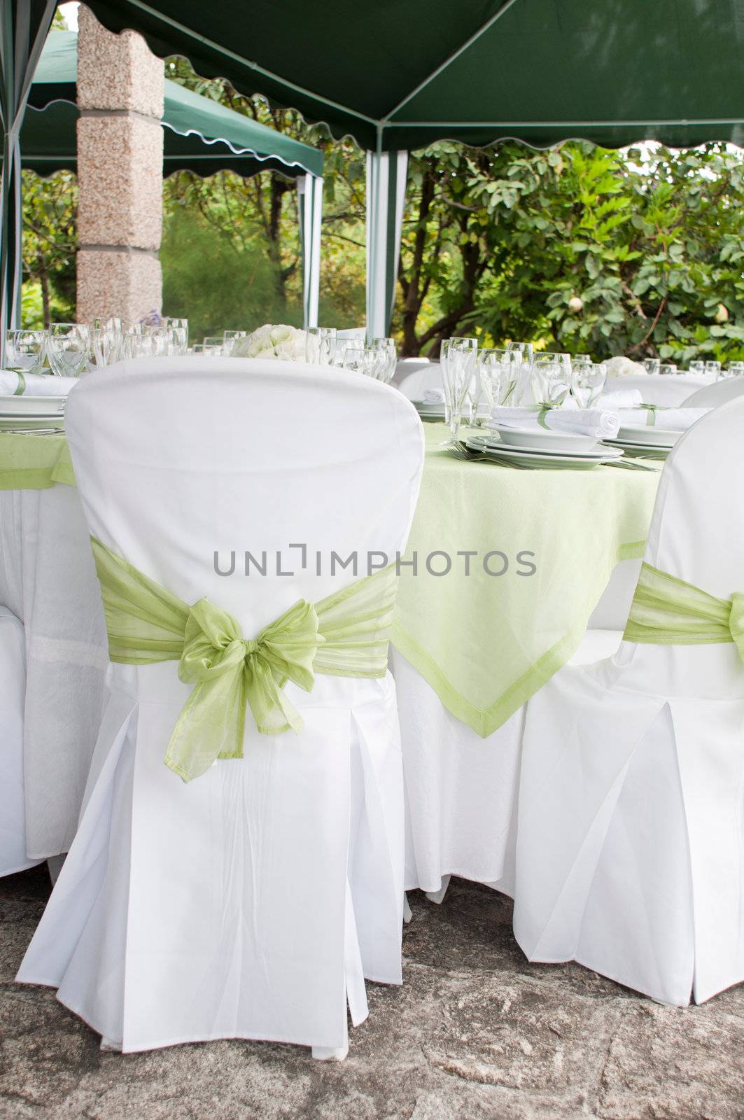 gorgeous wedding chair and table setting for fine dining at outdoors