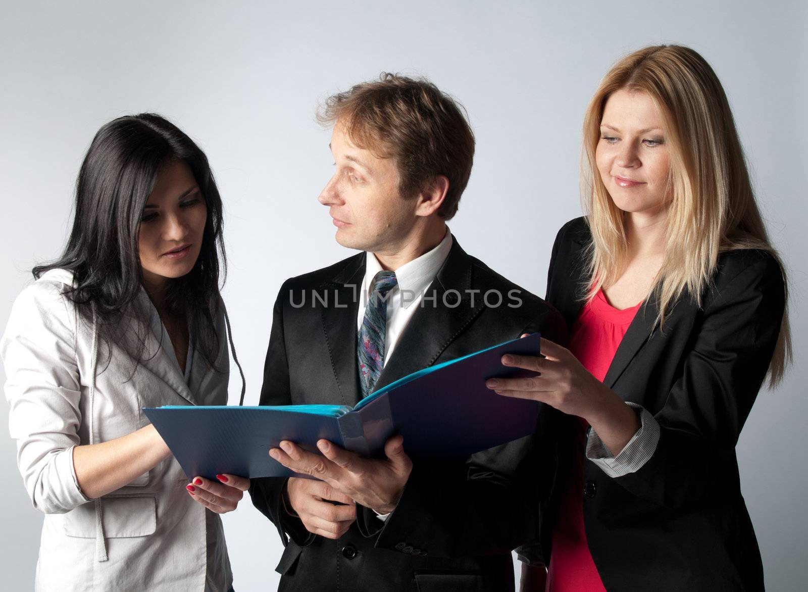 A group of young and successful men and women
