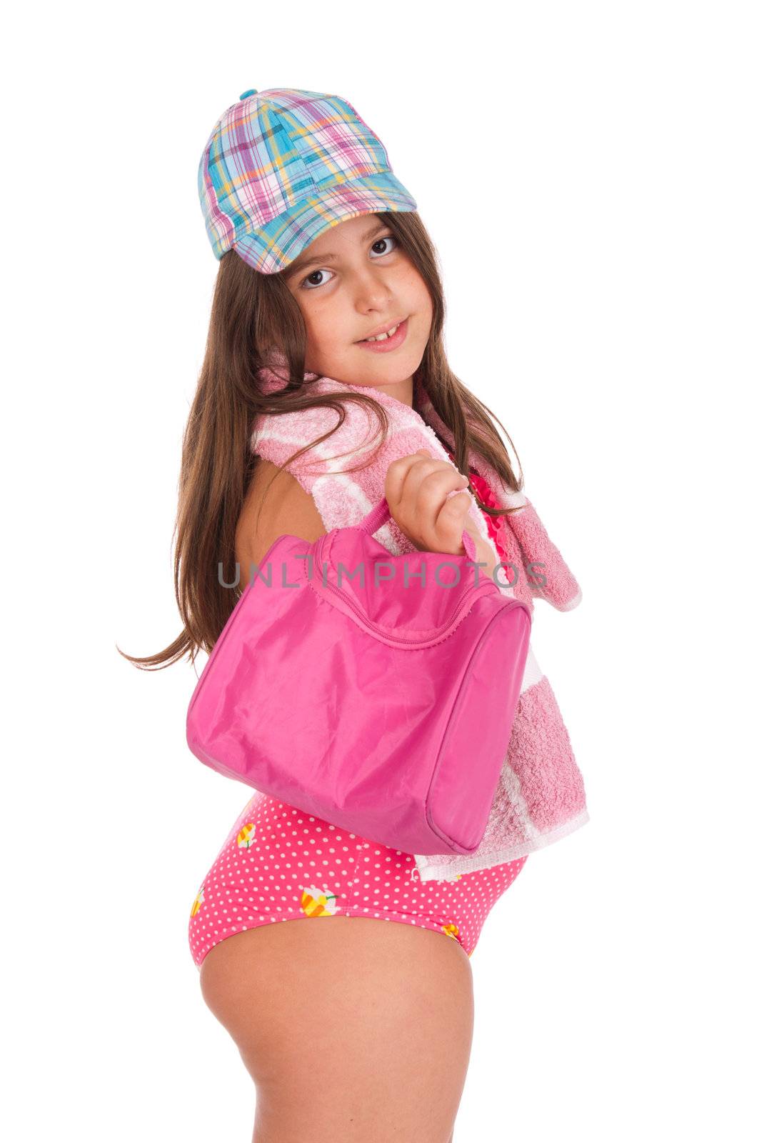 beautiful brunette teenage girl in swimsuit ready for the beach or pool with bag, cap and towel (isolated on white background)