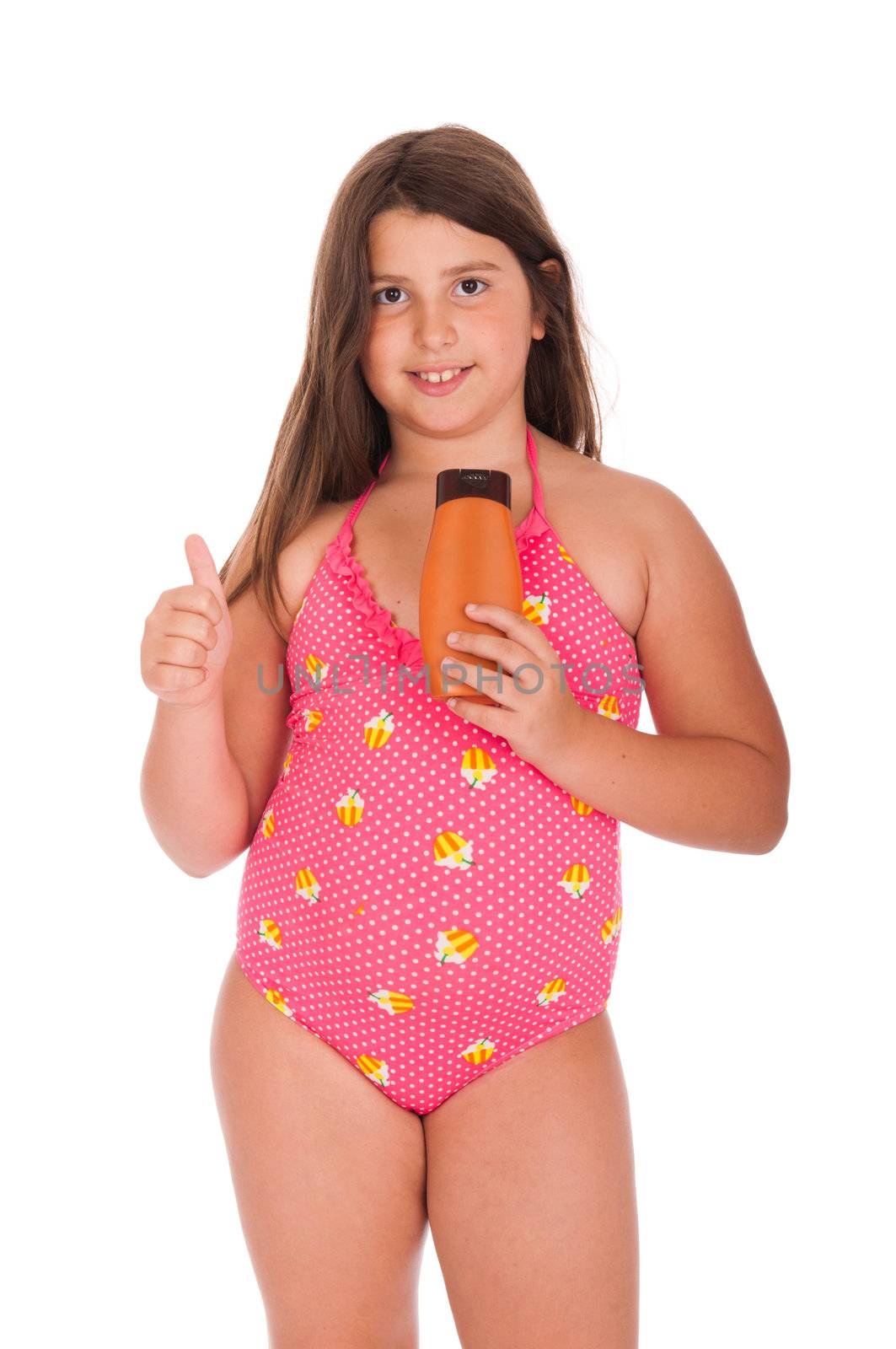 beautiful brunette teenage girl in swimsuit showing thumb up while holding sun lotion (isolated on white background)