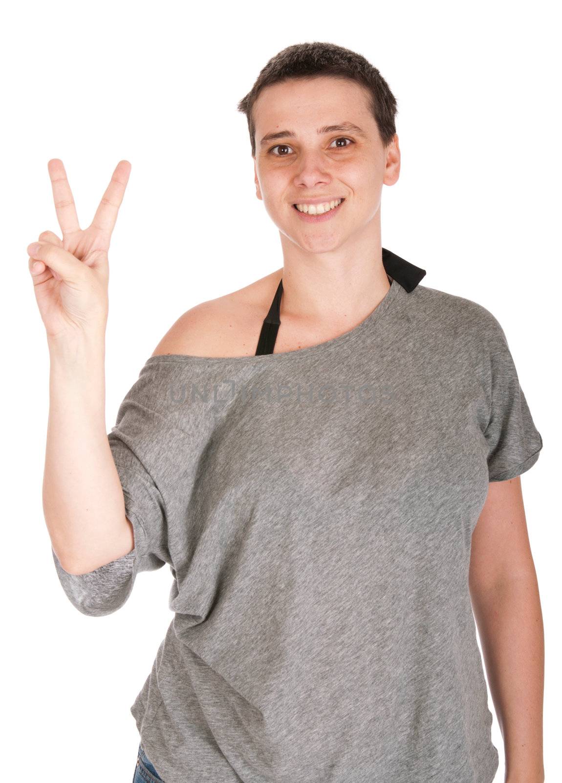 smiling casual woman showing victory hand sign, isolated on white background