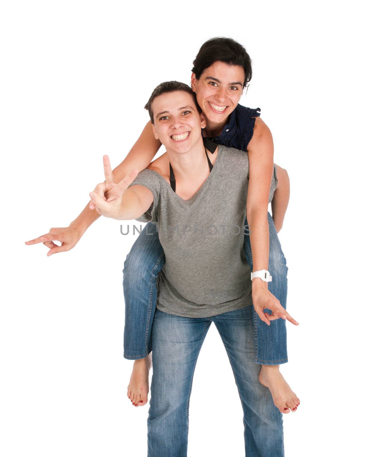 happy smiling sisters showing victory hand sign while playing together piggyback, isolated on white background