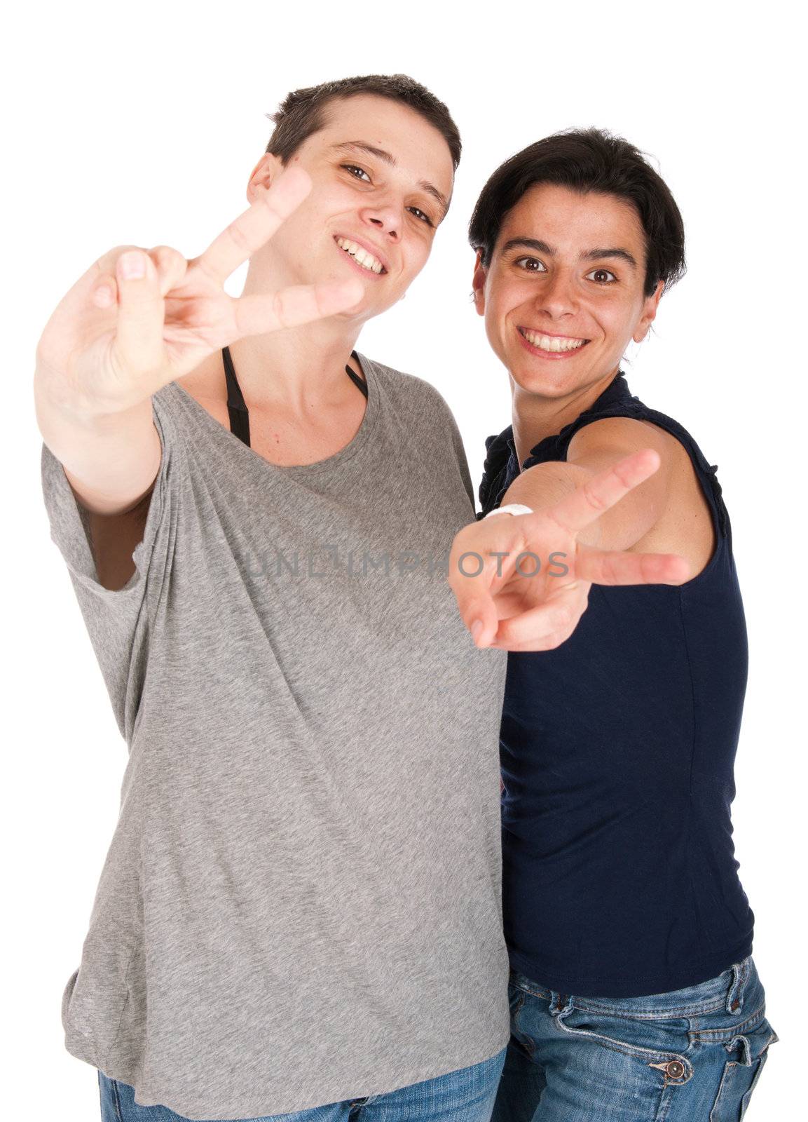 happy smiling sisters showing victory hand sign, isolated on white background