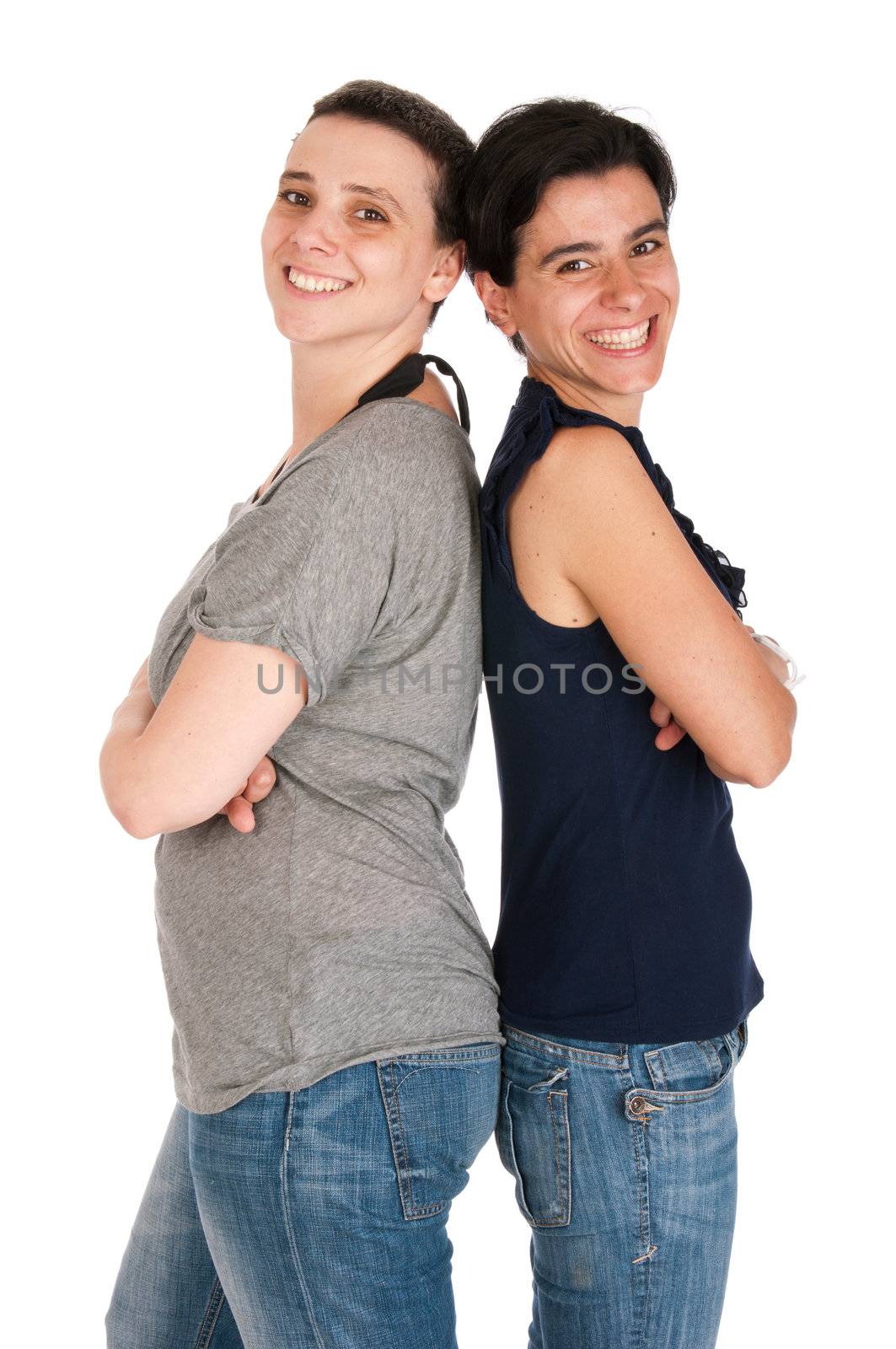 happy smiling sisters portrait in their 30s, isolated on white background