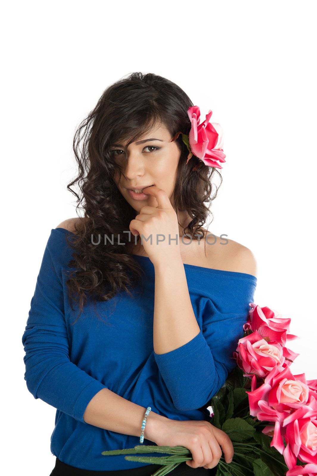 Beauty portrait of a brunette with bare shoulders.