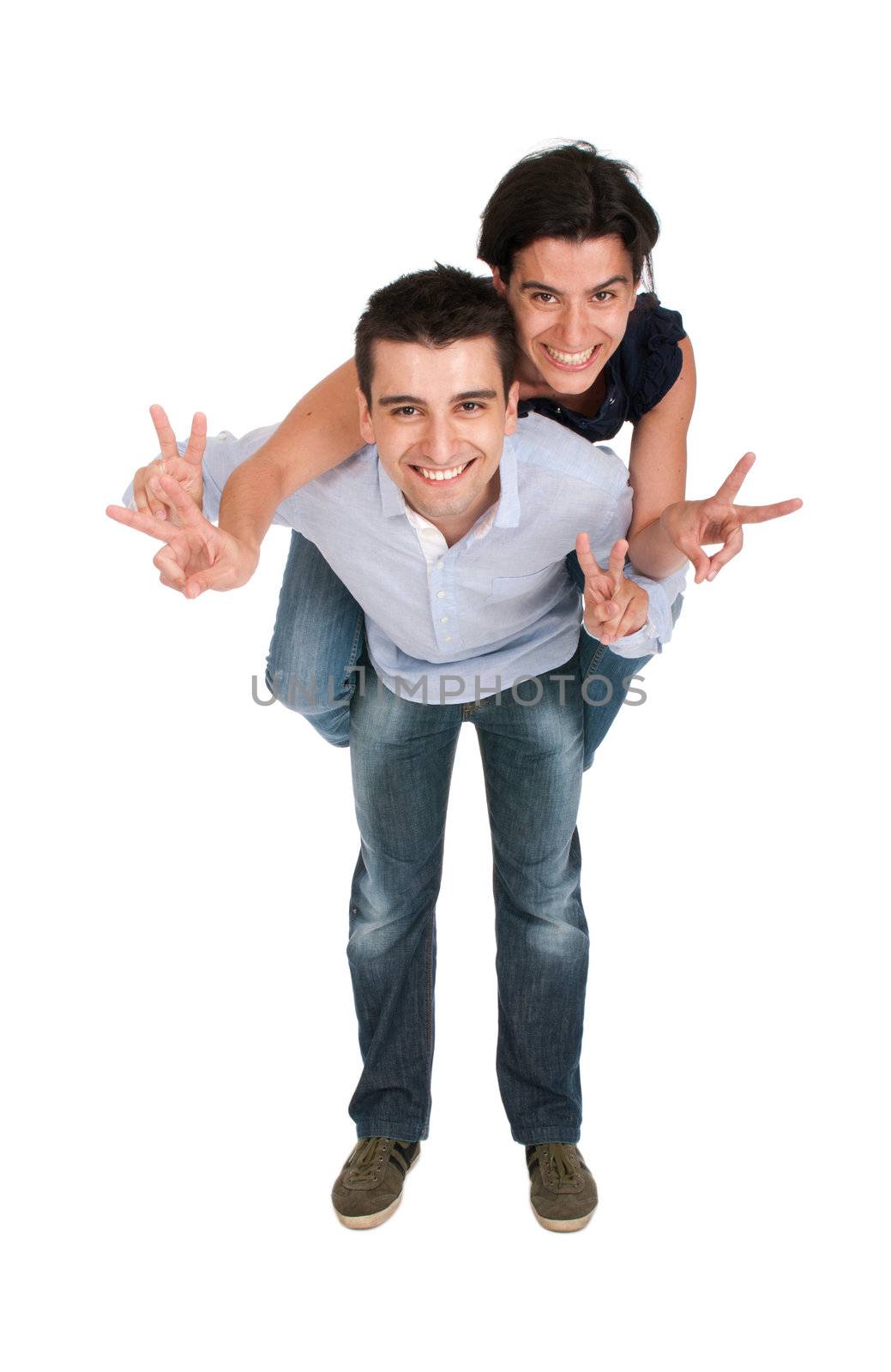 happy smiling brother and sister showing victory hand sign while playing together piggyback (full length picture, isolated on white background)