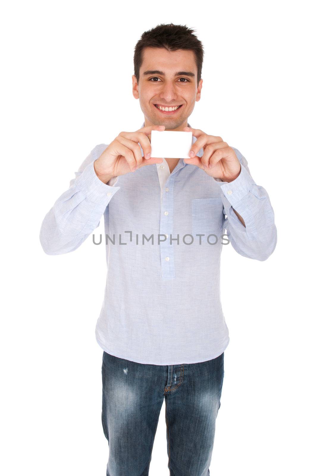 smiling young casual man holding blank white card (isolated on white background)