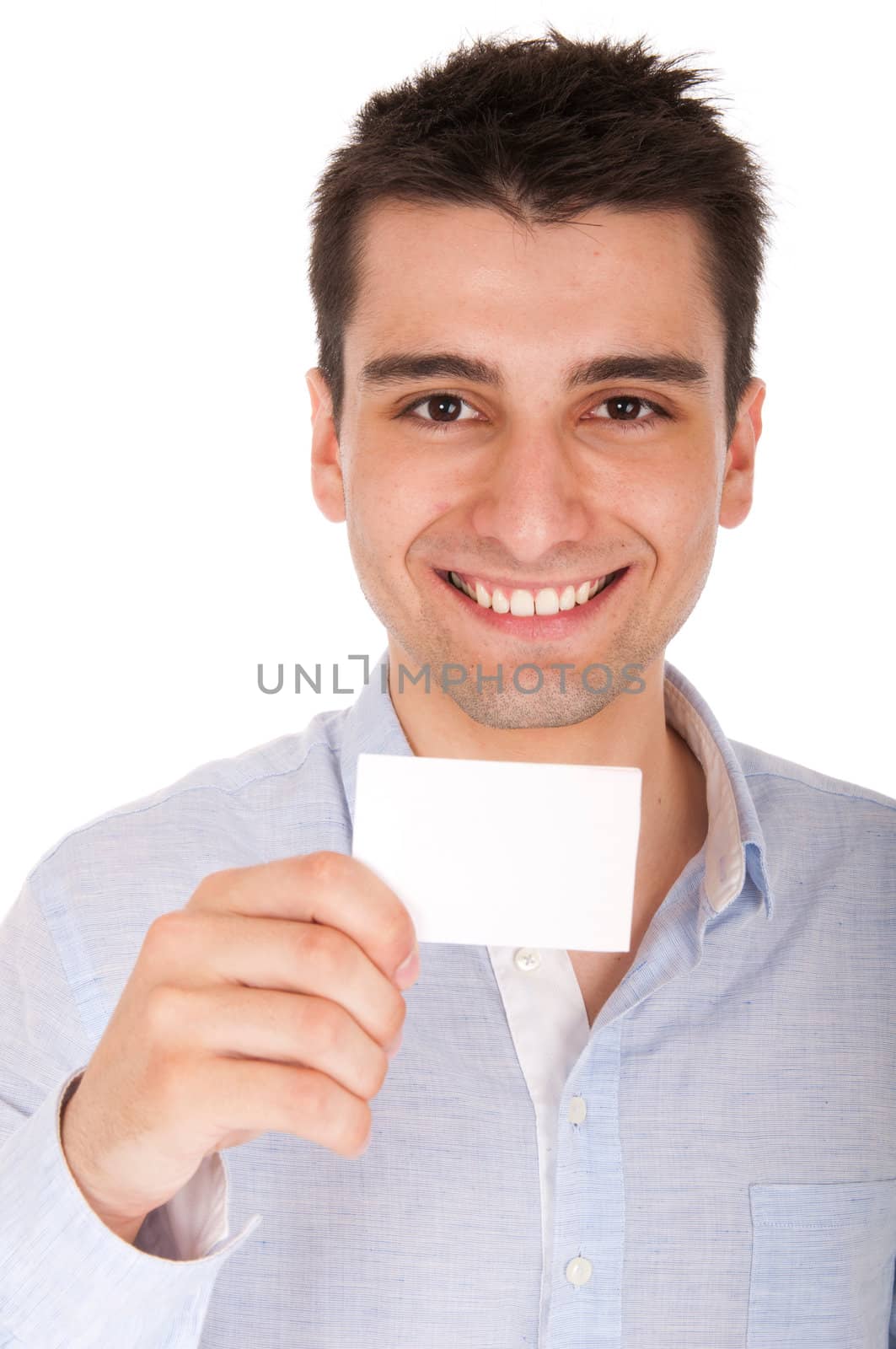 smiling young casual man holding blank white card (isolated on white background)