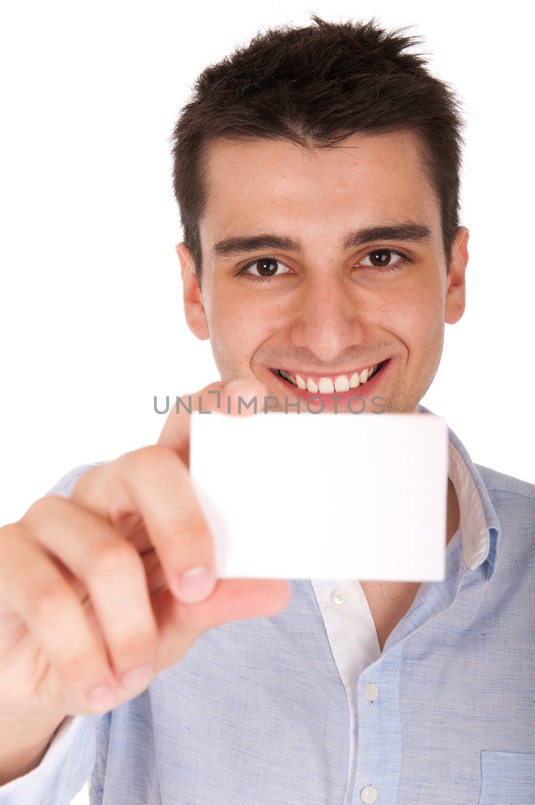 smiling young casual man holding blank white card (isolated on white background)