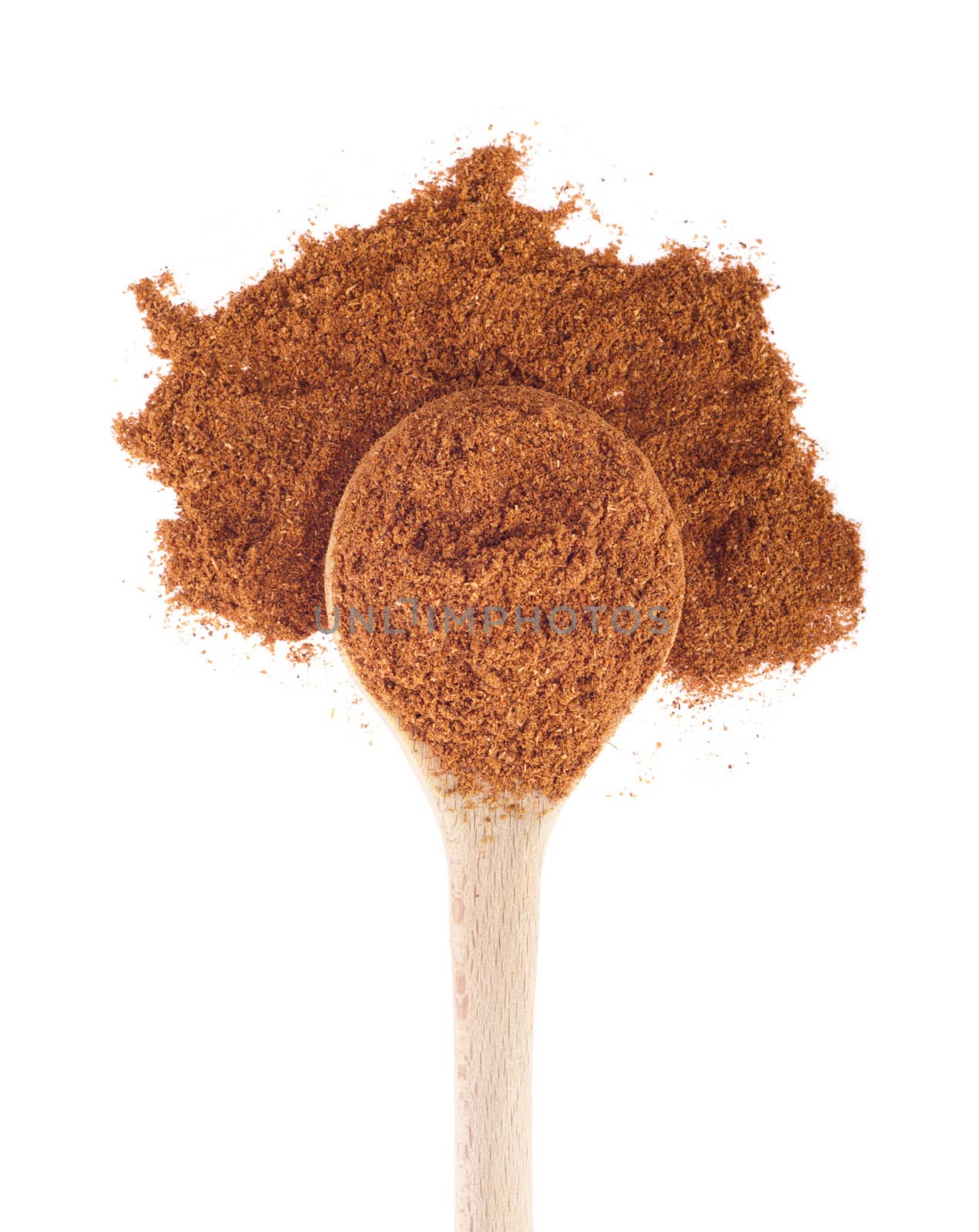 garam masala spice on a wooden spoon, isolated on white background
