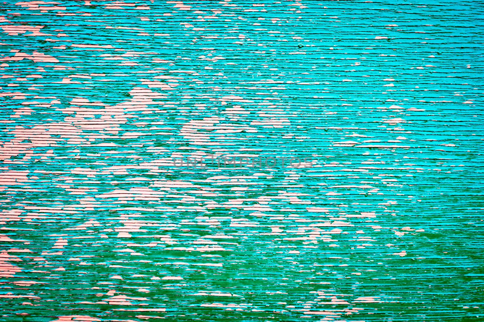Weathered painted wood as a unique background image