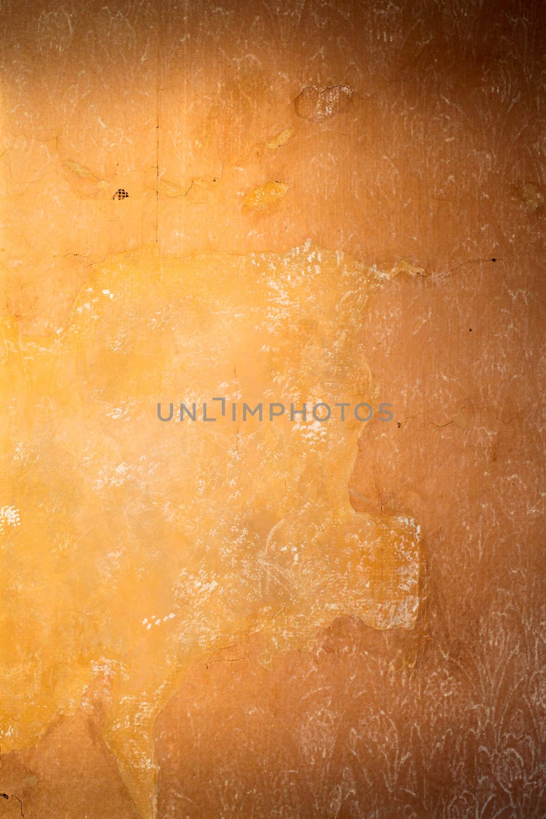 Old wall paper which has weathered over time