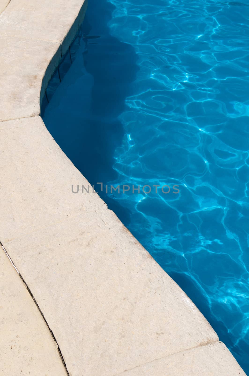 blue and vibrant swimming poolside