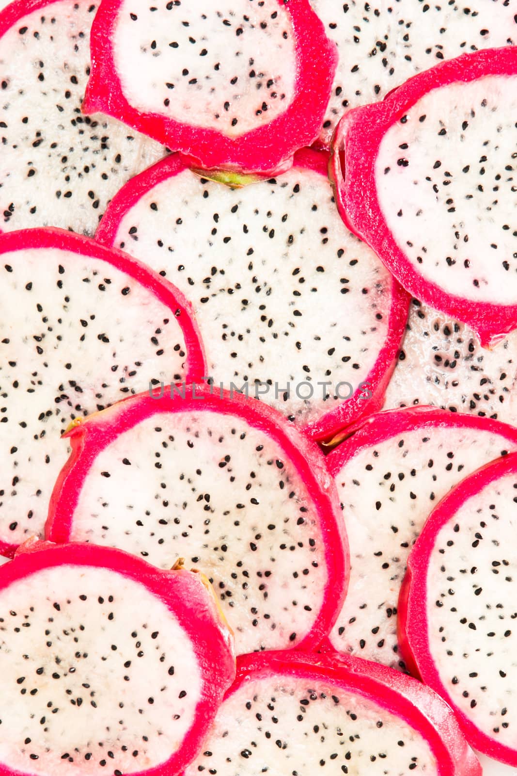 Sliced fresh dragon fruit as a detailed background image