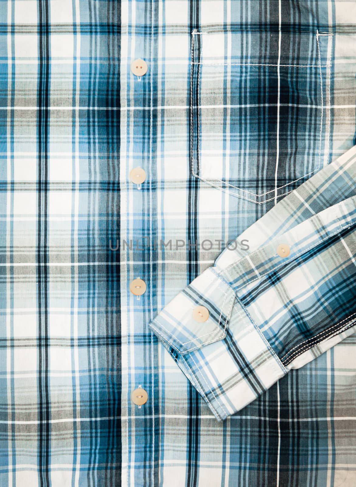 Close up of a casual man's shirt with a checked pattern