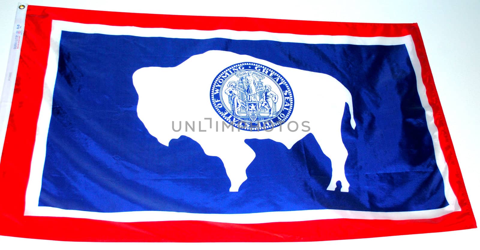Wyoming state flag displayed outdoors.