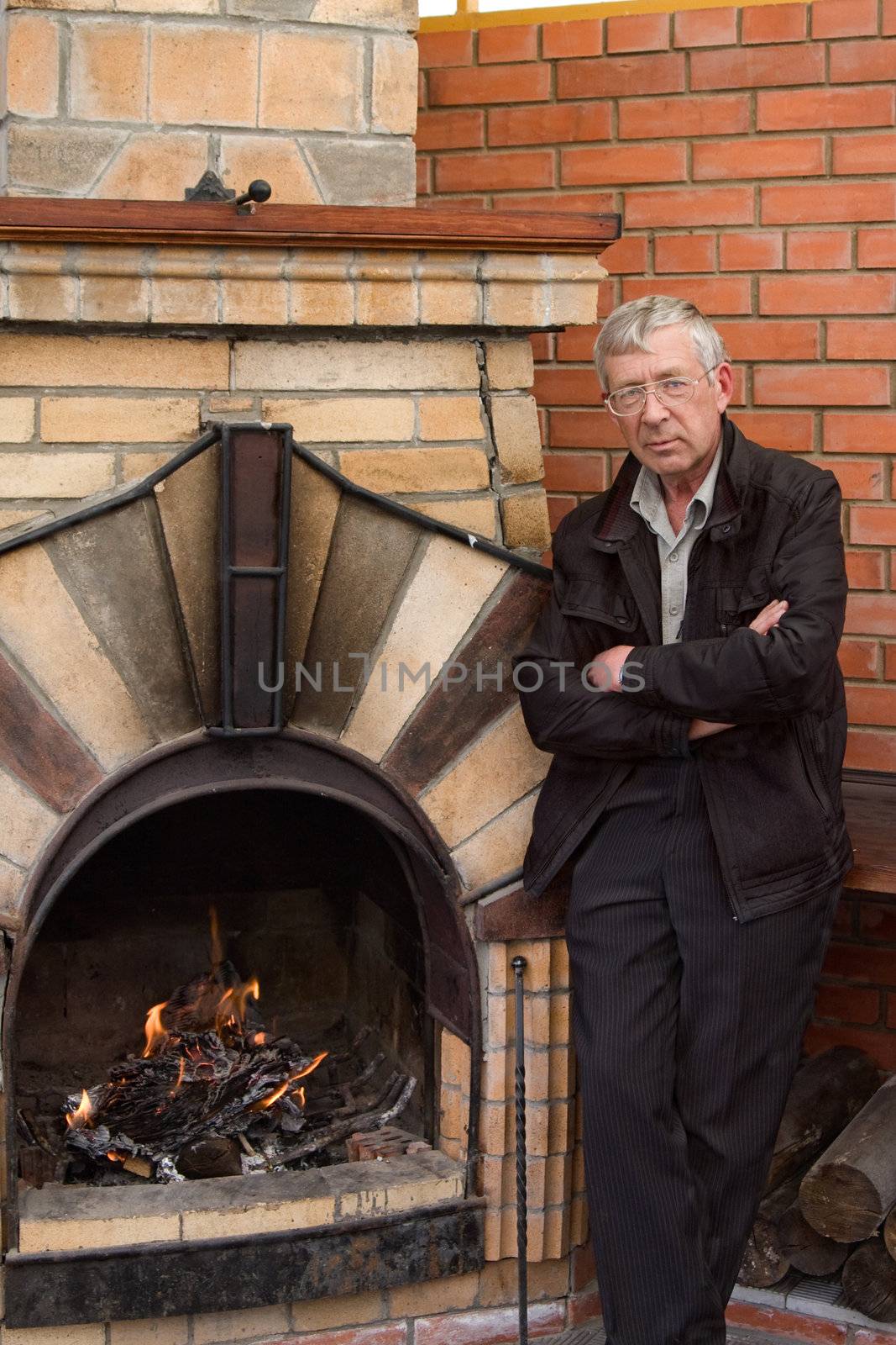 The man and a fireplace by Ohotnik