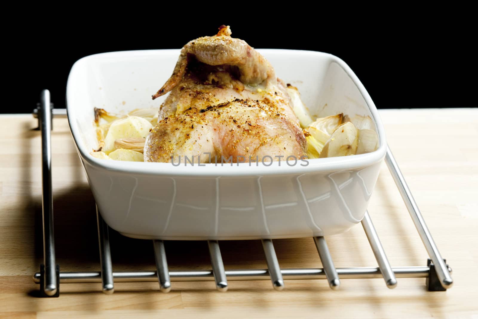 chicken baked with onion and potatoes